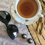 April dark gray ball earrings