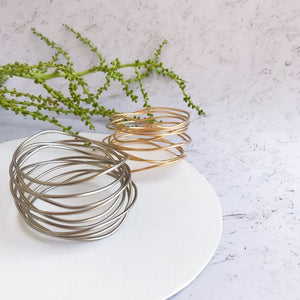 Modern gold wire bracelet